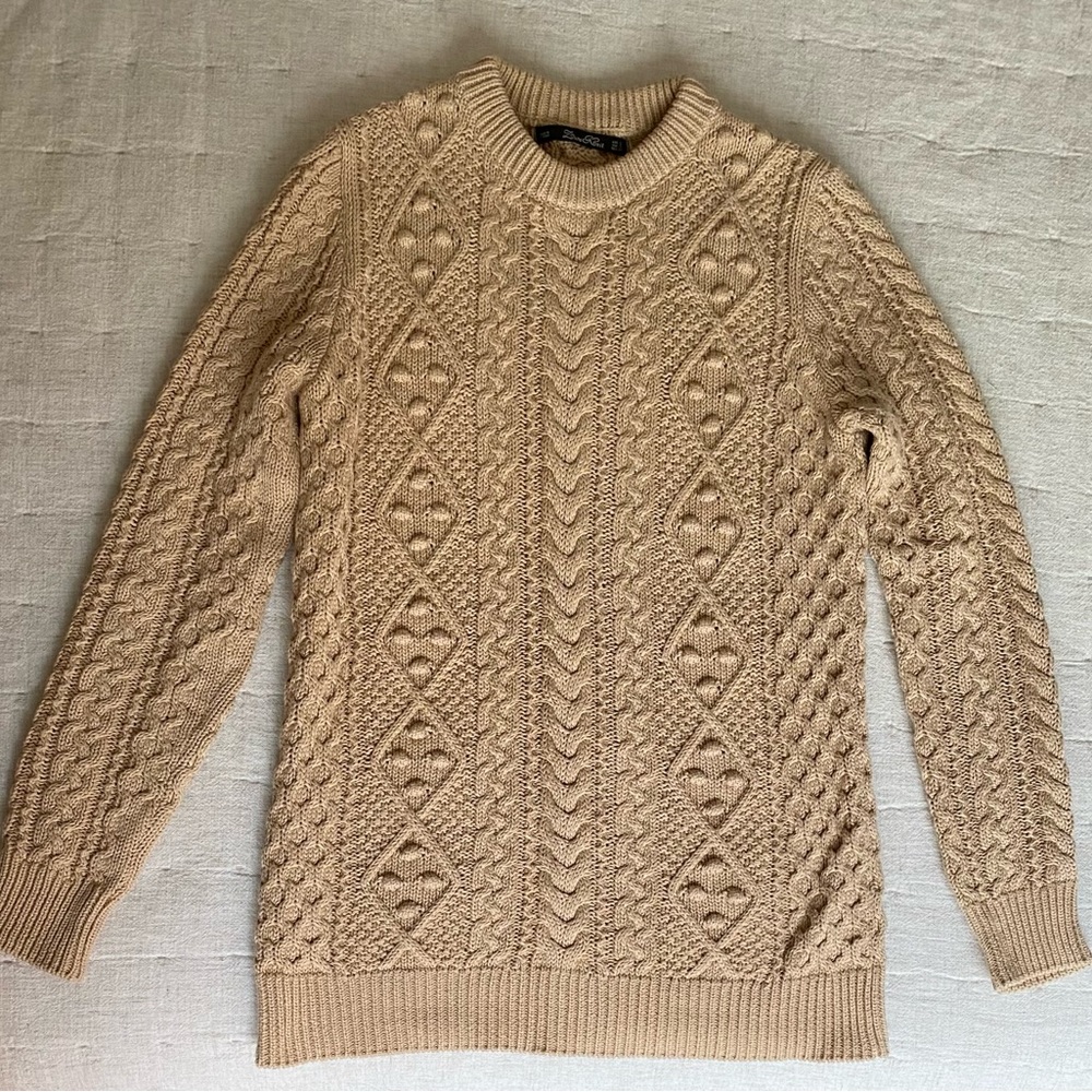 Beige wool sweater.